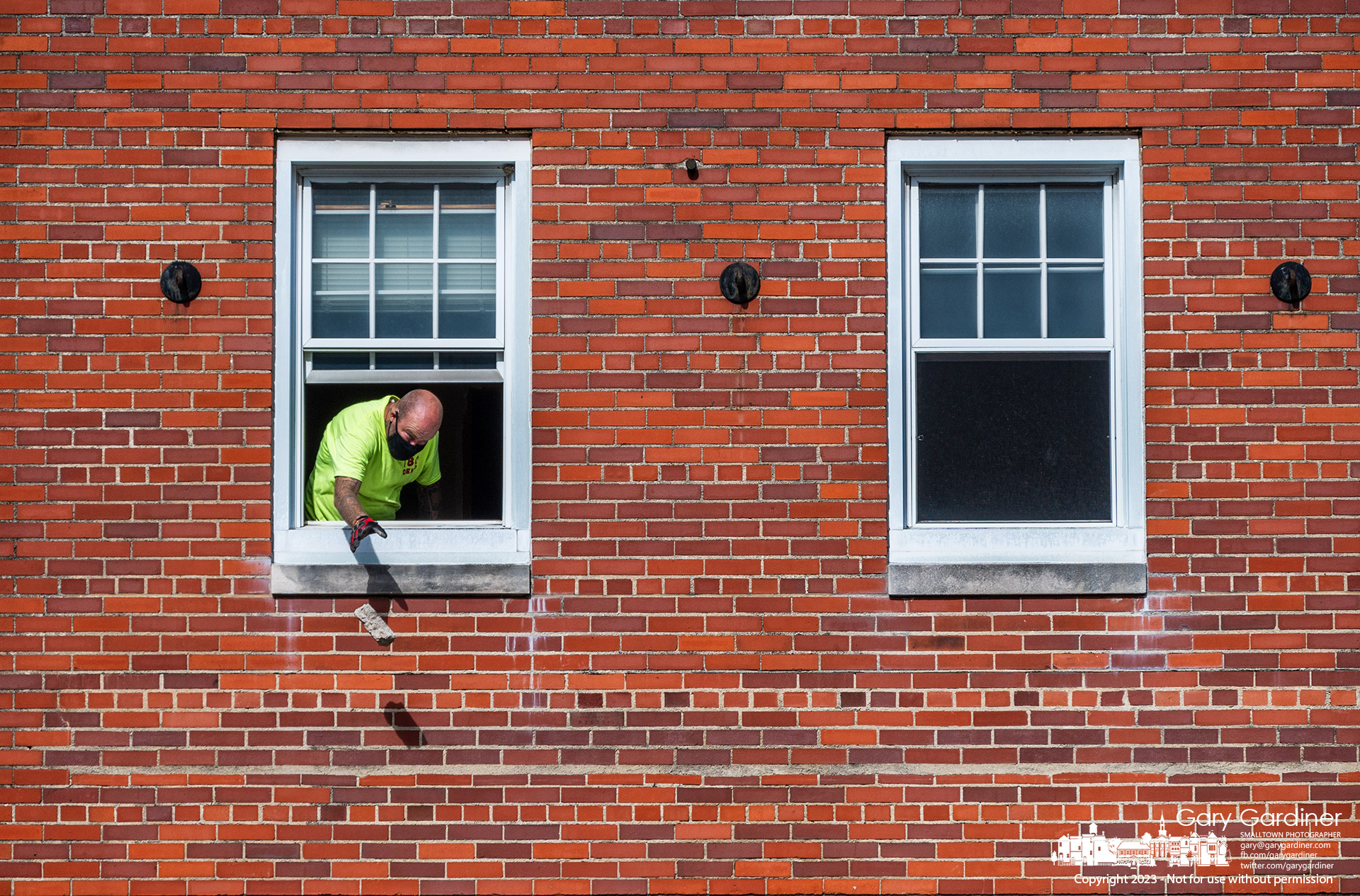 A demolition contractor removes debris from the second floor at the rear of the old Post Office in Uptown where High Banks Distillery plans to open a restaurant and speakeasy in what was last used by the Westerville Police detective bureau.