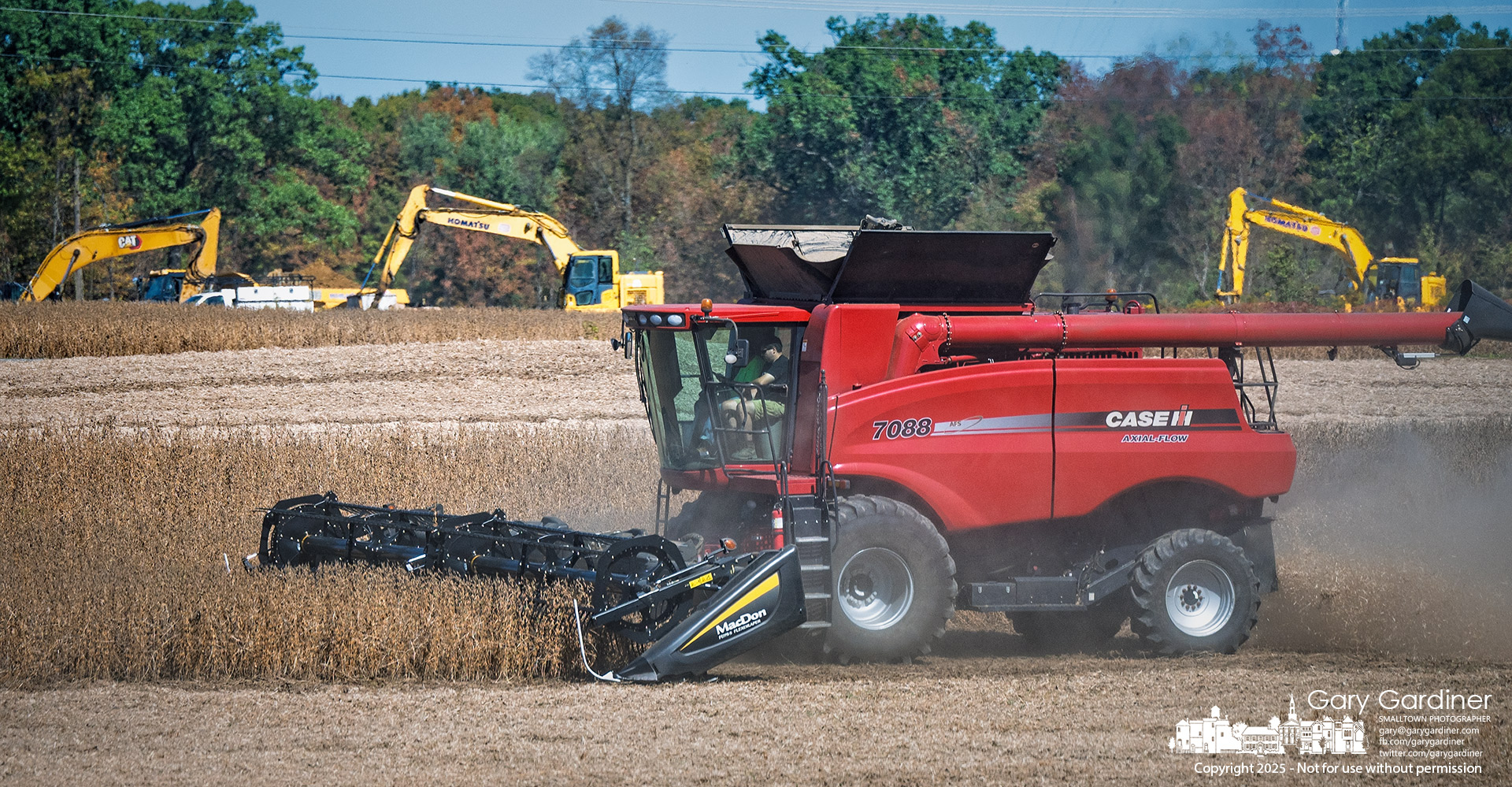 Encircled: The First Harvest in a New Era at Yarnell Farm This week’s soybean harvest at Yarnell Farm wasn’t just another routine in the farming calendar. It marked the first crop grown with the entire farm surrounded by development. On Tuesday and Wednesday, a combine moved through rows of soybeans off Africa Road in Delaware County, as construction equipment and new infrastructure developments loomed just beyond the field. What once was an expanse of open farmland is now hemmed in by offices, condominiums, and the latest commercial expansion.